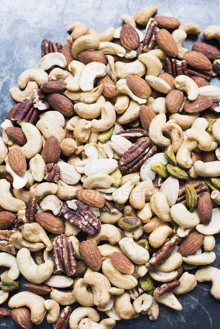 Top view of mixed nuts on tabletop — Stock Photo