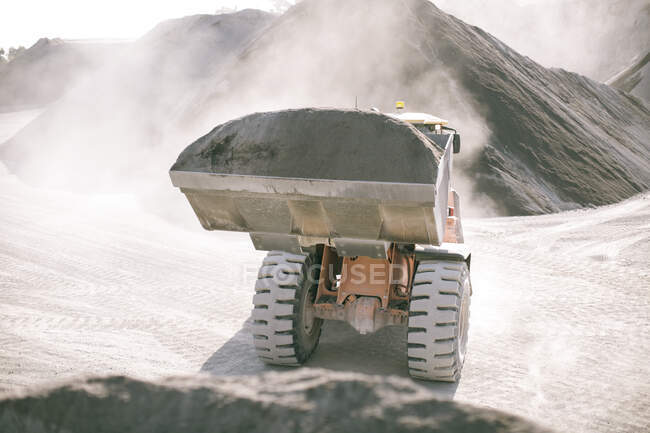 Heavy machinery in quarry — Stock Photo