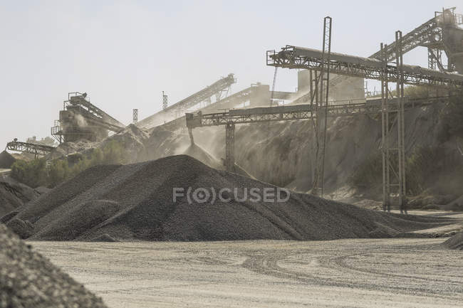 Piles of aggregate in quarry — Stock Photo