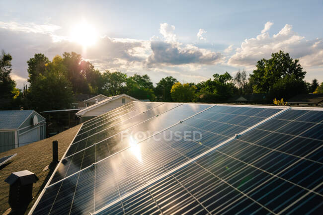 Solar panels on roof of house, elevated view — Stock Photo