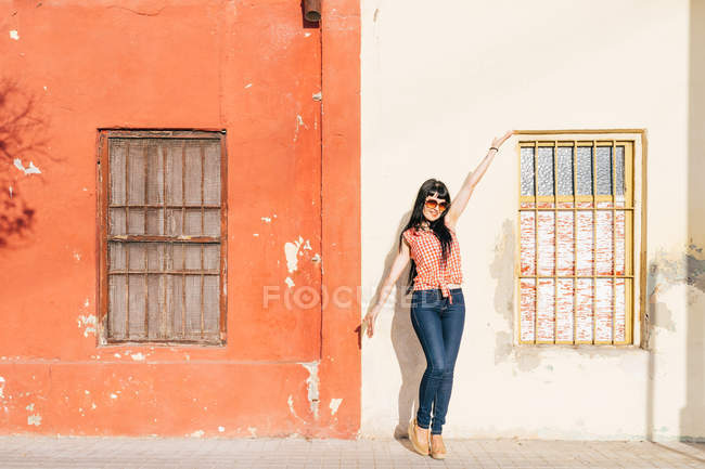 Mature female hipster posing on sidewalk, portrait — Stock Photo