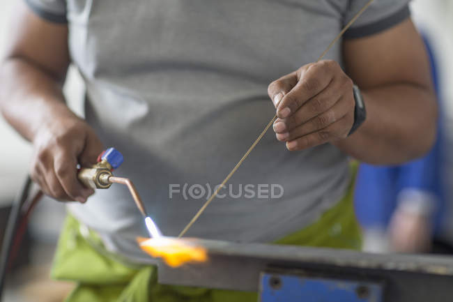 Cropped view of man welding in bodywork repair shop — Stock Photo