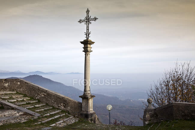 Stone cross Sacro monte di Varese, Varese, Lombardia, Italy, Europe — стокове фото