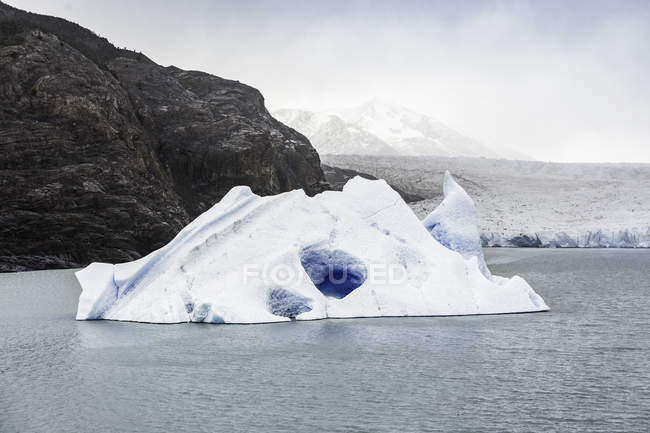 Grey glacier iceberg floating in lake, Torres del Paine National Park, Chile — Stock Photo