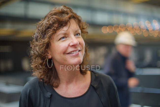 Portrait of woman looking away smiling — Stock Photo