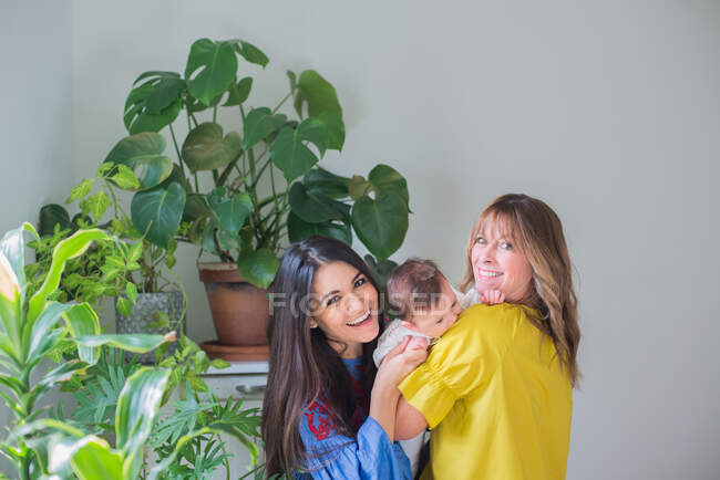 Two women with baby girl — Stock Photo