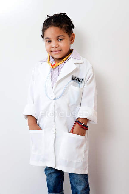 Portrait of girl dressing in doctor suit — Stock Photo