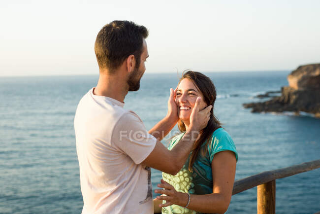 Couple laughing by seaside, Corralejo, Fuerteventura, Canary Islands — Stock Photo