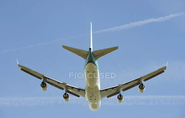 Low angle view of airplane taking off, Schiphol, North Holland, Netherlands, Europe — Stock Photo