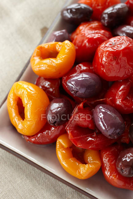 Close up of dried Olives and peppers — Stock Photo