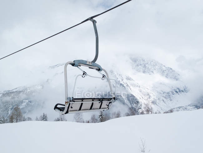 Ski lift chair on snowy Grand Massif, French Alps — Stock Photo