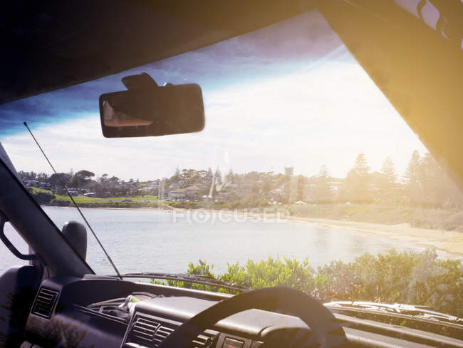 View of Bermagui, seen through windscreen of car, New South Wales, Australia — Stock Photo