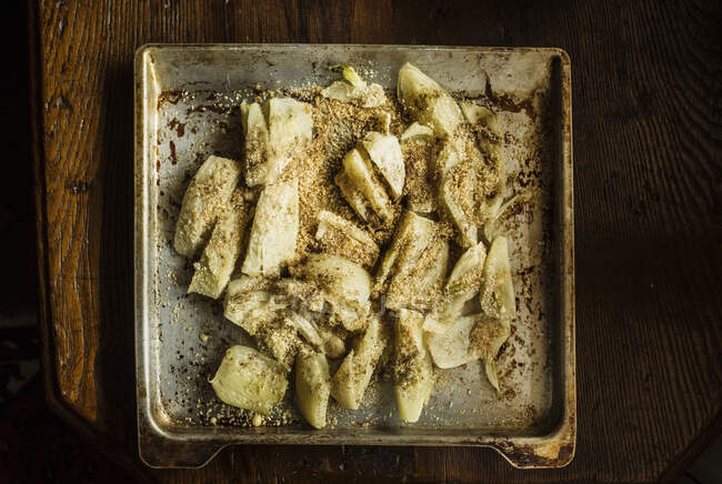 High angle close up of Fennel Gratin in metal baking tray. — Stock Photo