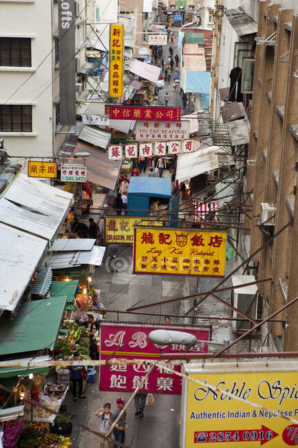 Shops and signs in street, Hong Kong, China — Stock Photo