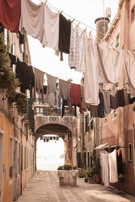 Street with laundry lines, Venice, Italy — Stock Photo