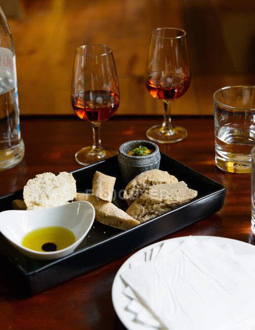 Appetisers, breads and dessert wine, Lisbon, Portugal — Stock Photo