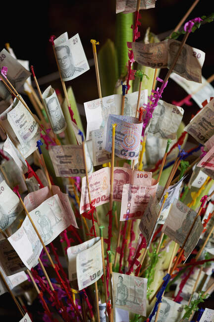 Money offerings on New Years day at a Buddhist Temple, Bangkok, Thailand — Stock Photo