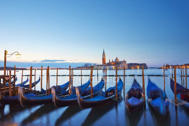 Gondolas in front of  San Giorgio Maggiore at dusk, Venice, Venece — Stock Photo