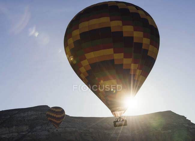 Hot air balloon at sunrise in red valley, Goreme National Park — Stock Photo