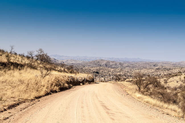Dirt road from Windhoek to Walwedans in the Namibrand Nature Reserve — Stock Photo