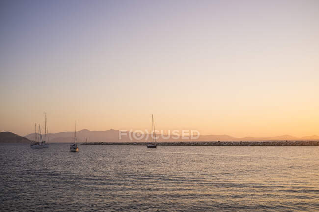 View of yachts and sea at dusk, Naxos Island, Greece — Stock Photo