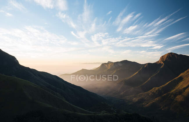 Sunrise over hills and valley, Top Station, Kerala, India — Stock Photo