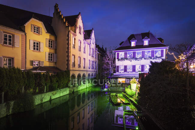 Floodlit canal and christmas lights at night, Little Venice, Colmar — Stock Photo