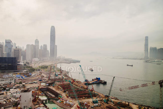 High angle view of construction cranes at Victoria harbour — Stock Photo