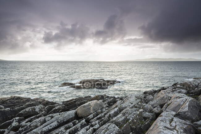 Looking west over Sound of Taransay at sunset from Geodh Mhartai — Stock Photo