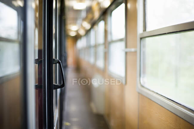 Diminishing perspective of train carriage passageway — Stock Photo