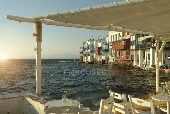 Sunlit view from coastal restaurant, Mykonos, Cyclades, Greece — Stock Photo