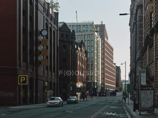 Calles abandonadas del centro de la ciudad en Manchester durante el período de bloqueo en la pandemia del Coronavirus. - foto de stock