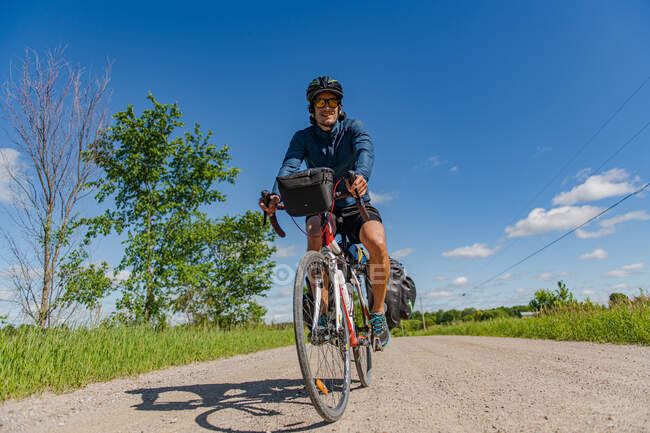 Cyclist on bicycle, Ontario, Canada — Stock Photo