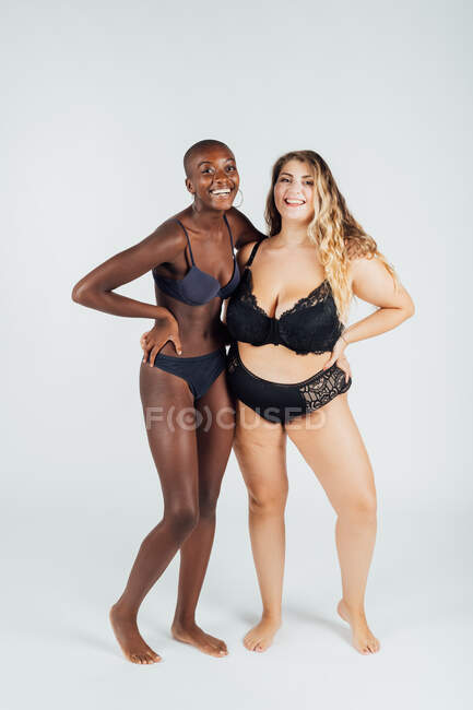 Two confident young women wearing underwear — Stock Photo