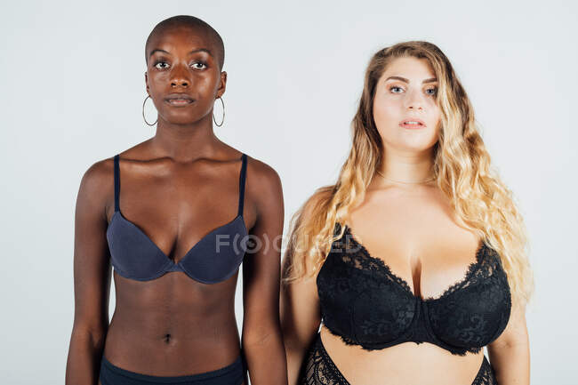 Portrait of two young women wearing underwear — Stock Photo