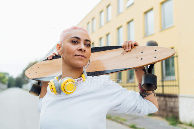 Confident portrait of a skateboarder — Stock Photo