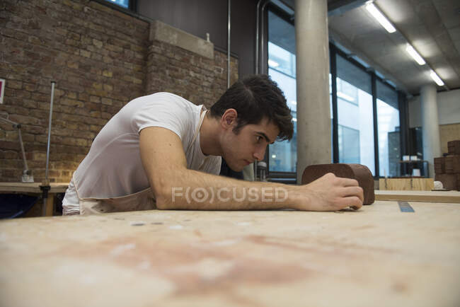 Art student in workshop — Stock Photo
