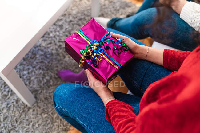 Woman holding a gift — Stock Photo