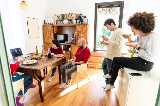 Friends having meal together and making video call — Stock Photo