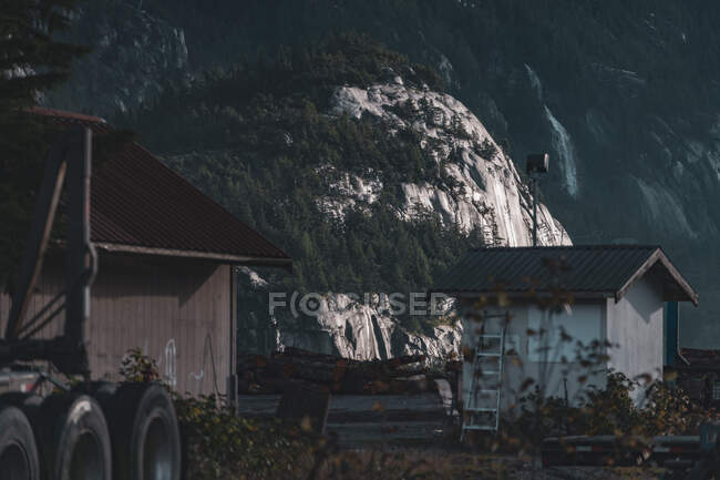 Canada, British Columbia, Squamish, Lumberyard at foot of mountain — Stock Photo
