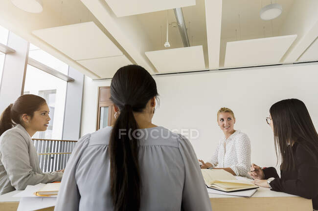 Germany, Bavaria, Munich, Women at business meeting in office — Stock Photo