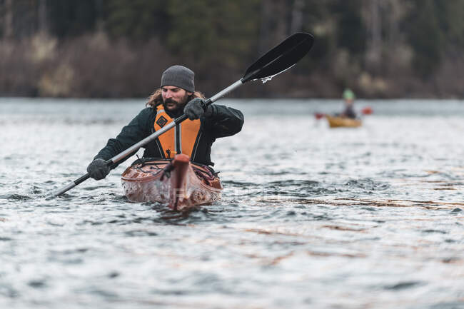 Canada, British Columbia, Man kayaking in Squamish River — Stock Photo