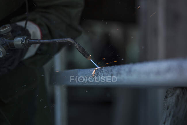 Italy, Premosello Chiovenda, Verbania, Worker using welding torch — Stock Photo