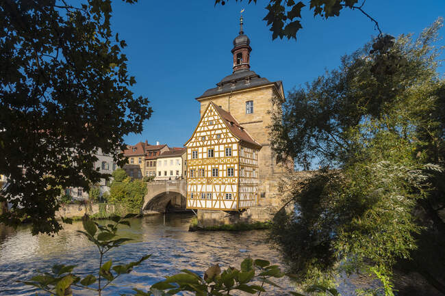 Germany, Bavaria, Bamberg, Old town hall on Regnitz river — Stock Photo
