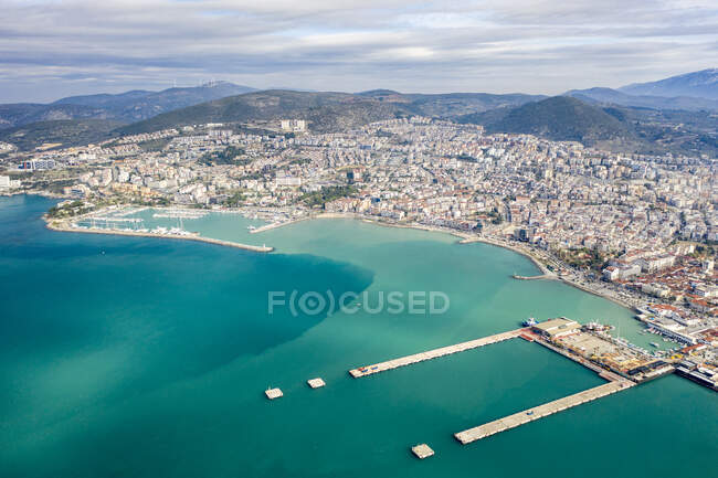 Turkey, Aydin, Kusadasi, Aerial view of sea and city — Stock Photo
