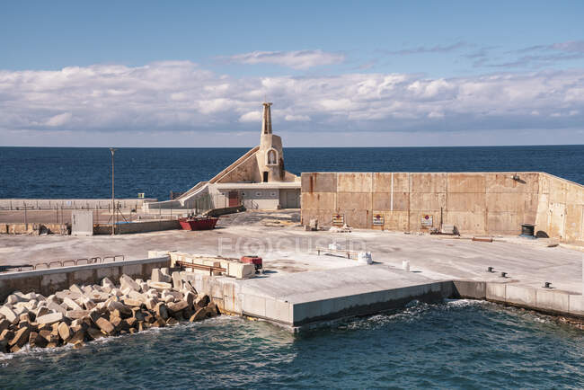 Malta, Mellieha, Chapel in stone harbor — Stock Photo