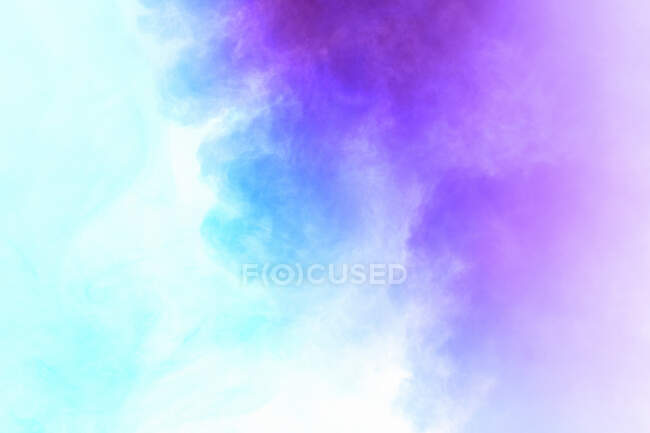 Colorful smoke against white background — Stock Photo