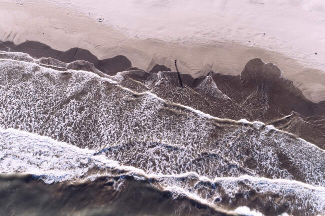 Spain, Valencia, Overhead view of sea waves beach — Stock Photo
