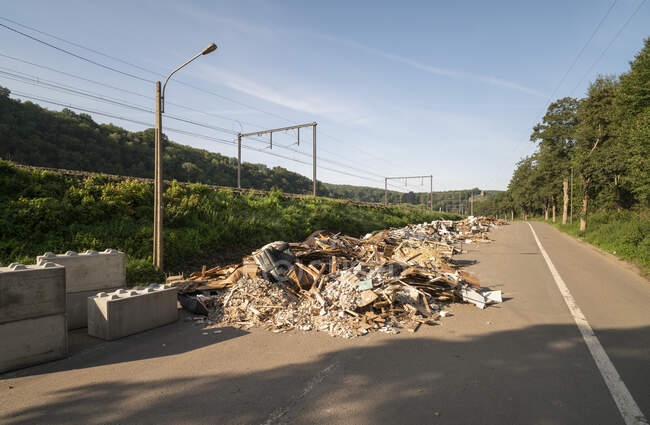 Belgium, Pepinster, Rubble on road damaged by flood — Stock Photo