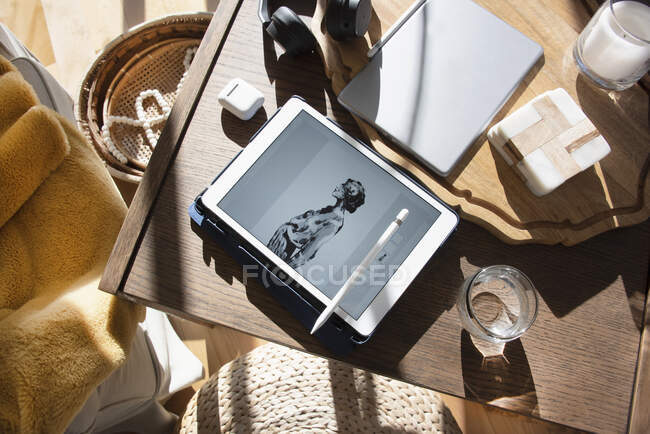 Canada, Overhead view of tablet on wooden table — Stock Photo